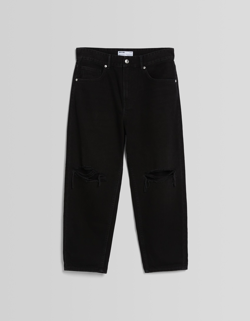 Calça jeans folgada com rasgos