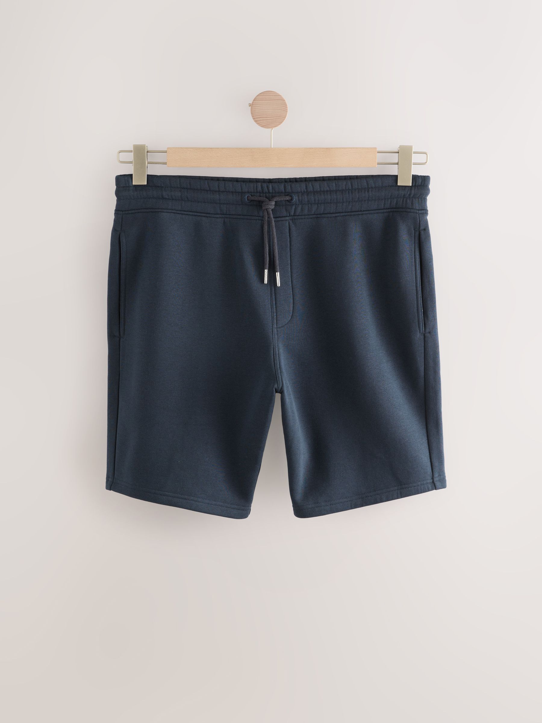 Marineblauw - Geborstelde jersey shorts met ritszakken