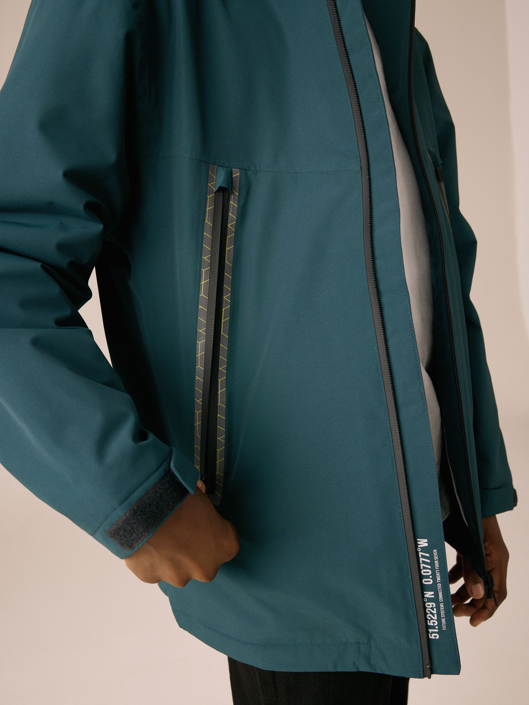 Groen - Waterdichte jas met fleece voering en capuchon (3-17jr)