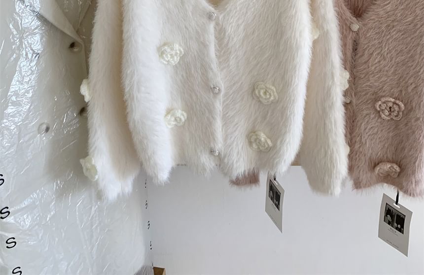 Dute - V-hals vest met bloemendetail en knopen