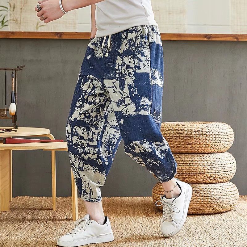 Acrius - Cropped baggy broek met trekkoord en patroonprint