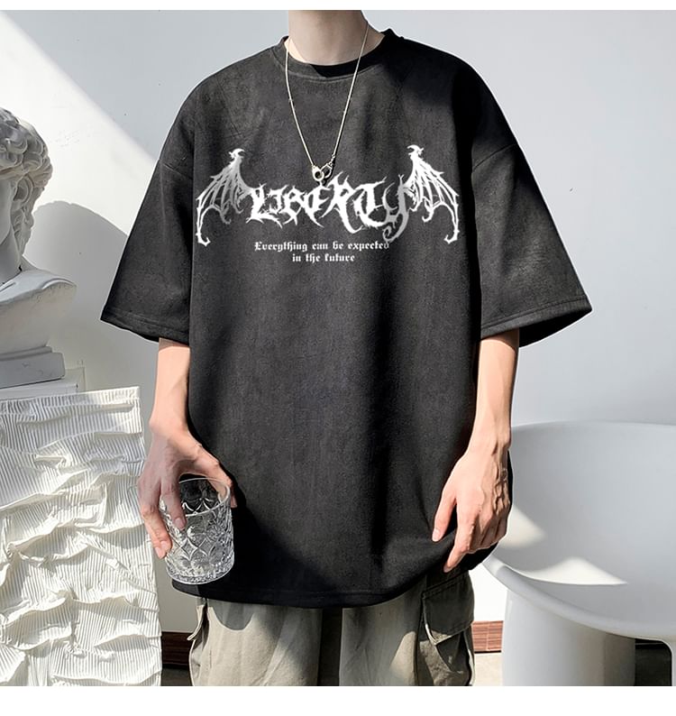 Bay Go Mall - T-shirt met korte mouwen, ronde hals en bloemenprint in krantenstijl