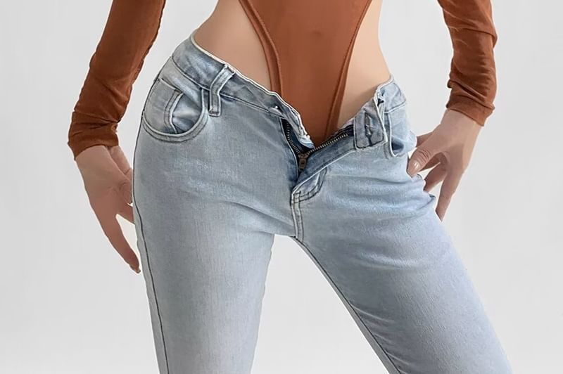 Haneliz - Bodytop met lange mouwen en ritssluiting en effen hals