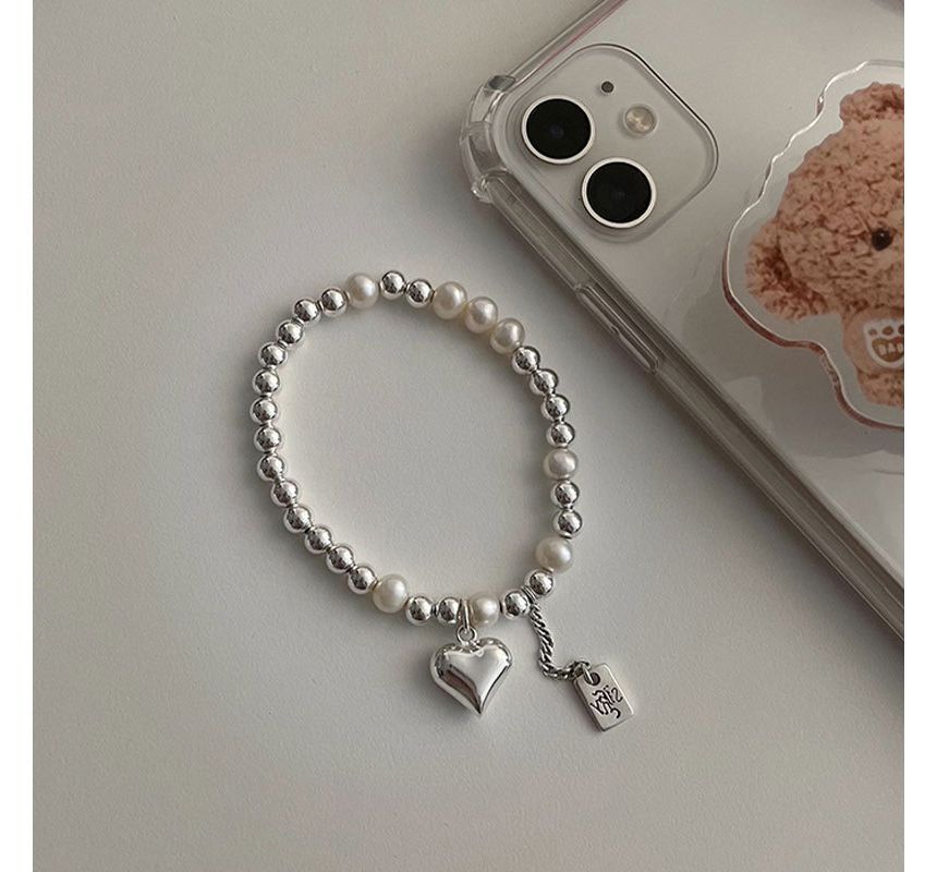 Catharsis - Hartvormige armband van imitatieparels