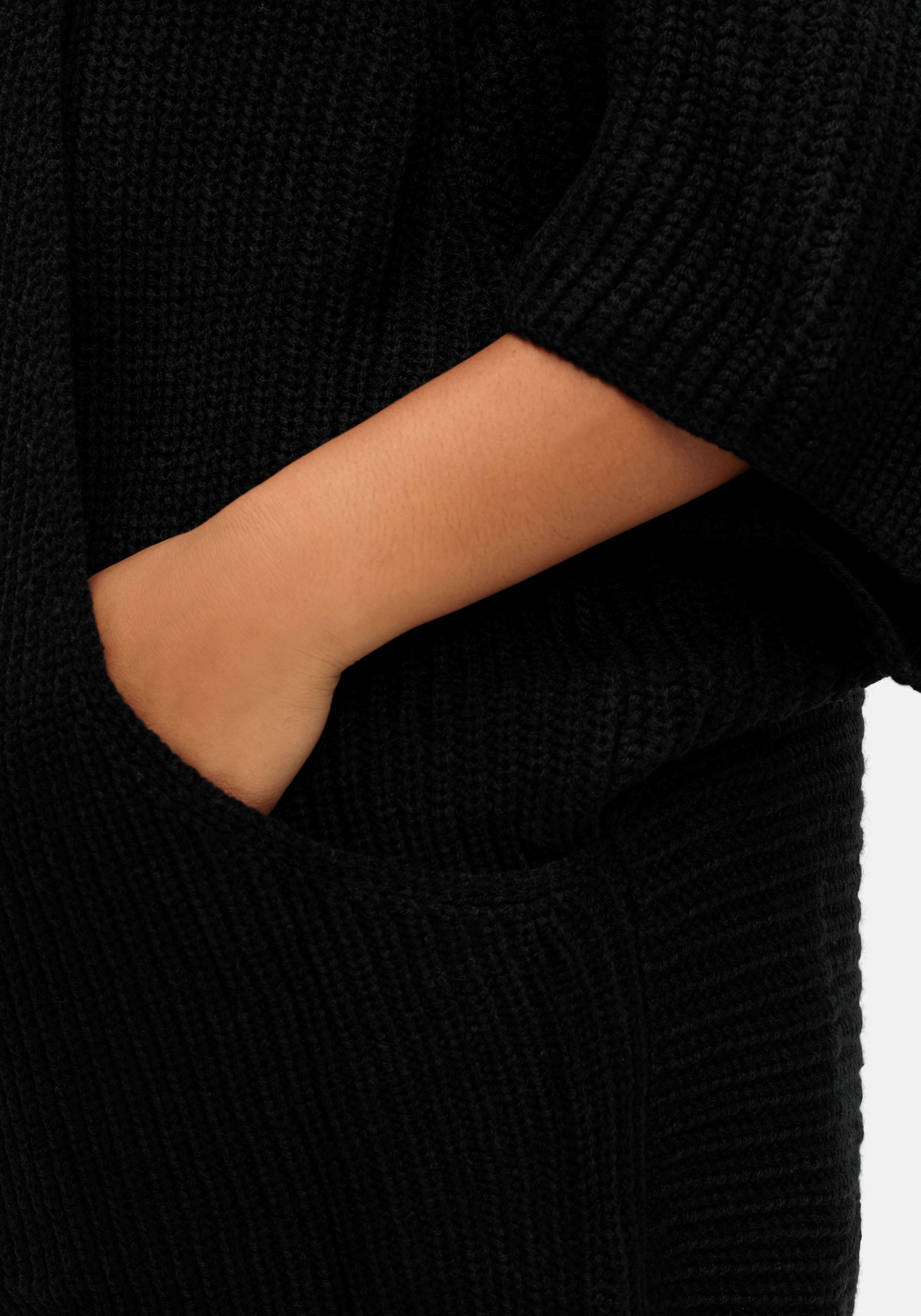 Strickjacke in offener Form, mit verkürztem Ärmel