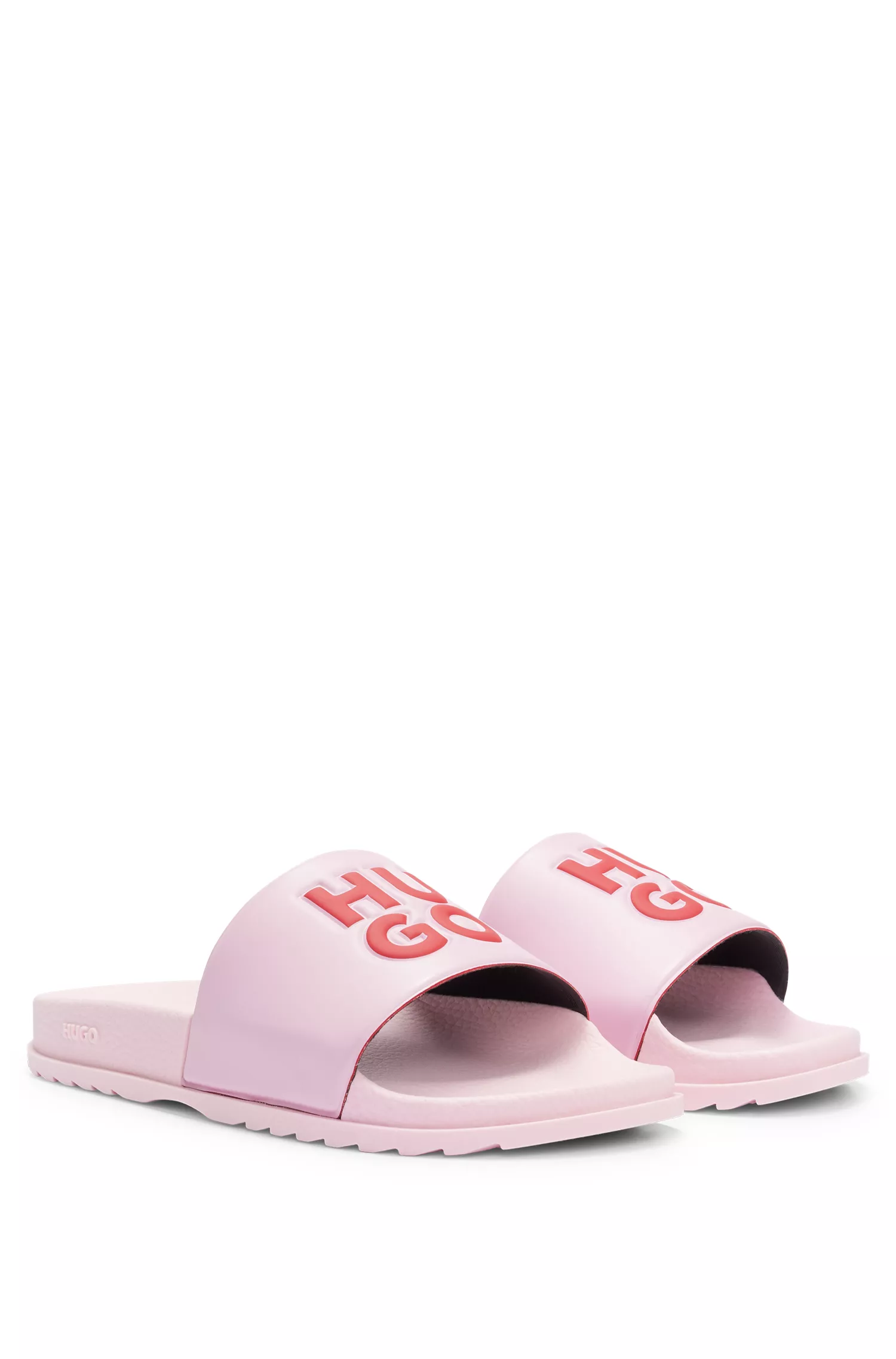Chinelo HUGO vermelho, fabricado na Itália, com logotipo empilhado.