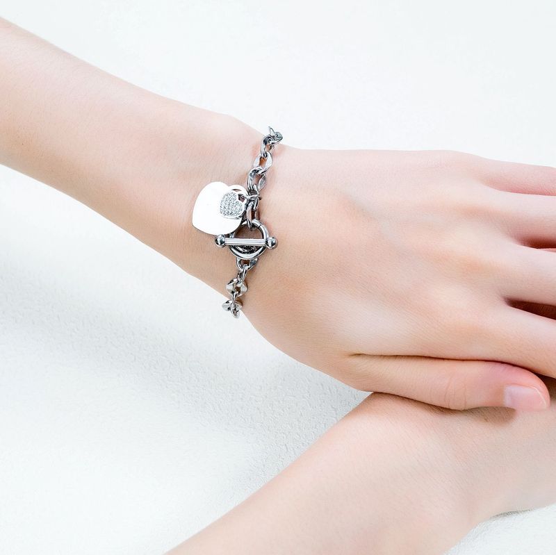 RVS armband met groot hart en klein hart met steentjes