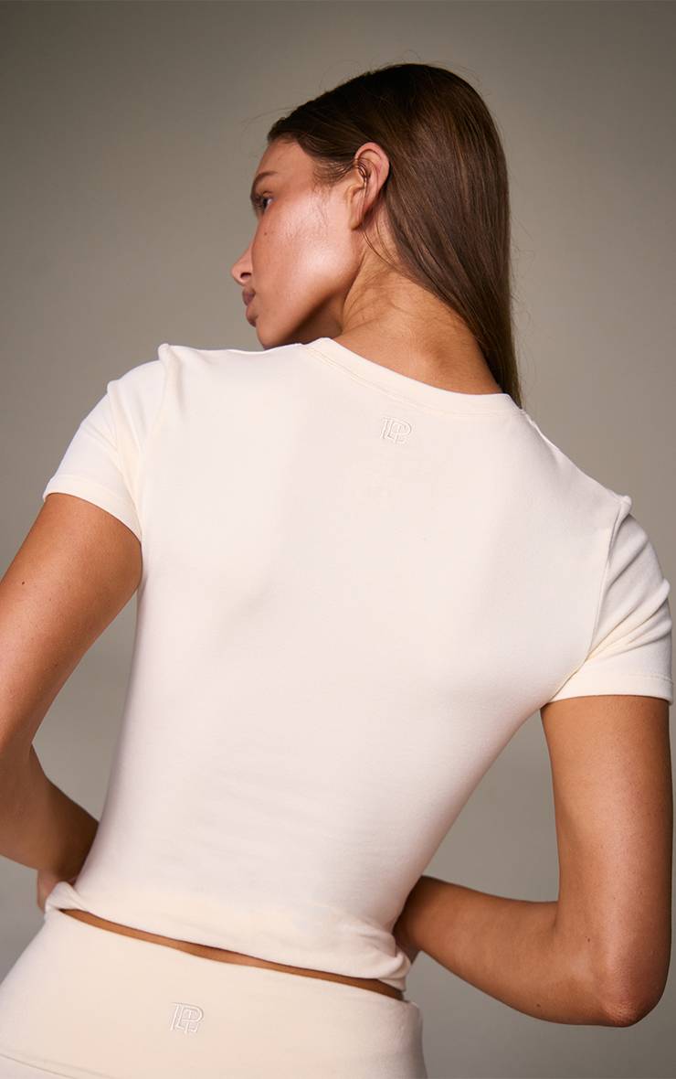 Crème Haut Ajusté À Manches Courtes En Coton Doux