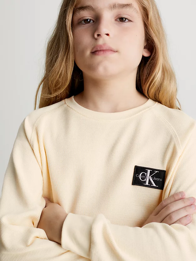 Blusa de malha texturizada com modelagem folgada