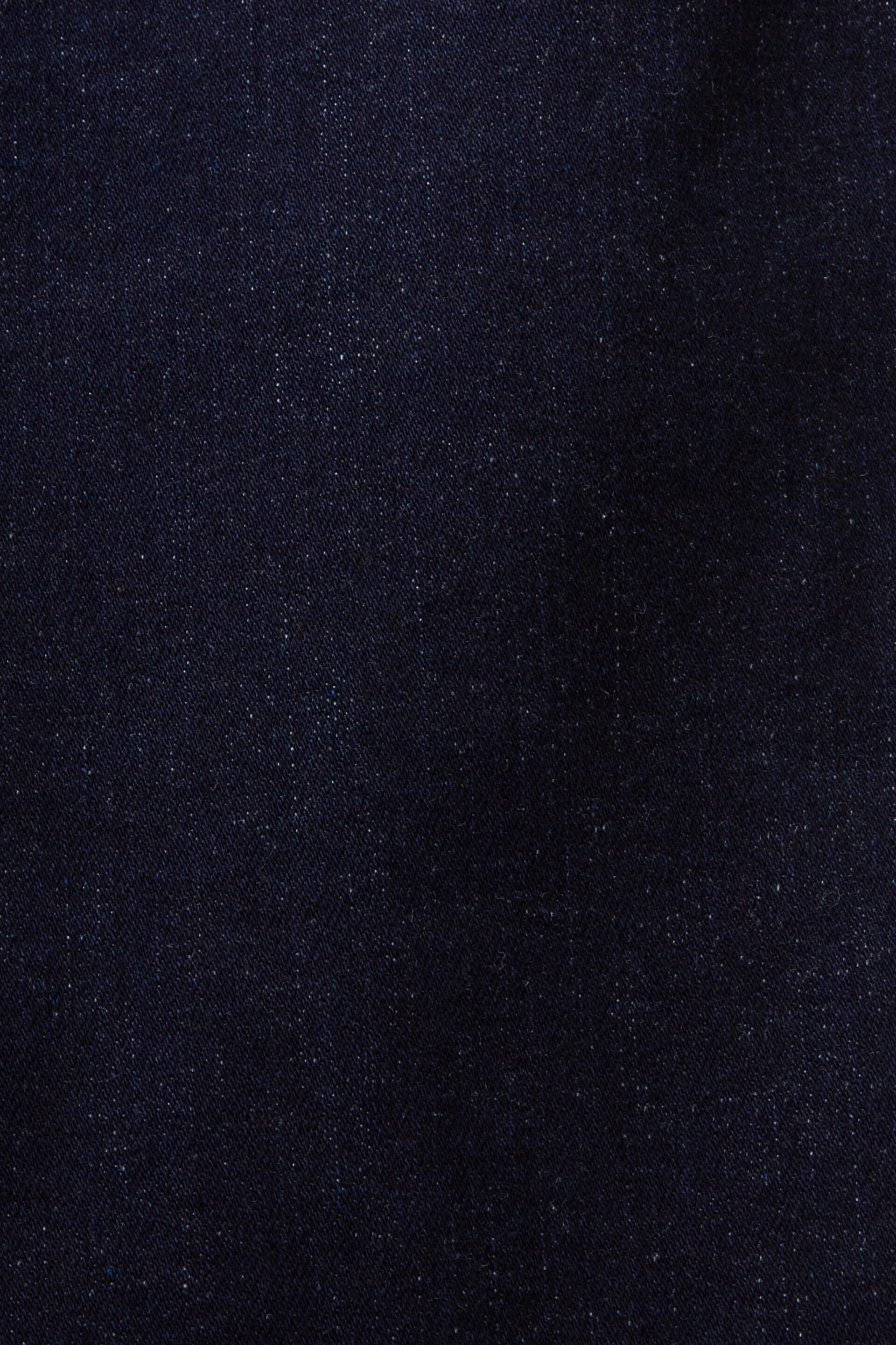 En matière recyclée : jean stretch de coupe Slim Fit à taille mi-haute