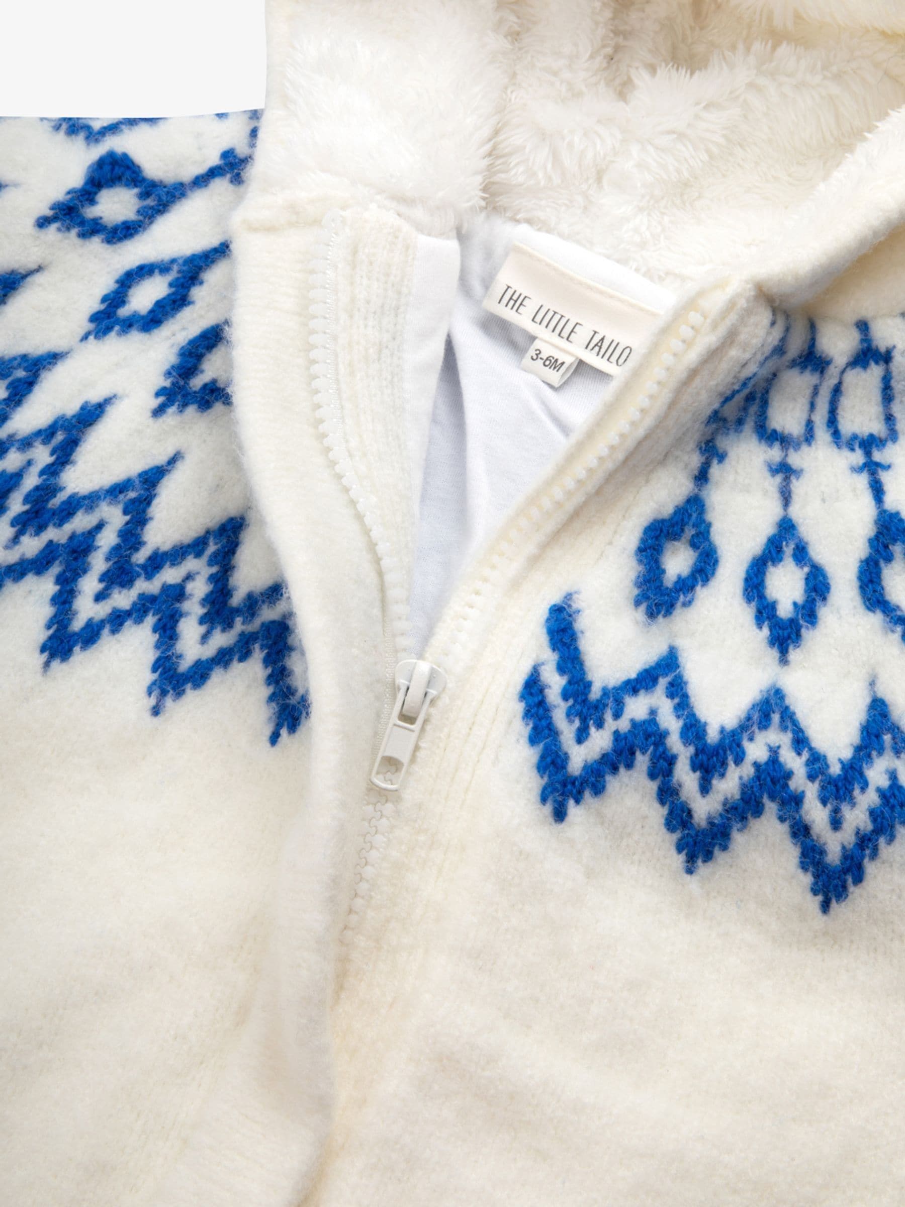 Blauw - The Little Tailor Zacht gebreid gevoerd kerstpakje voor baby's