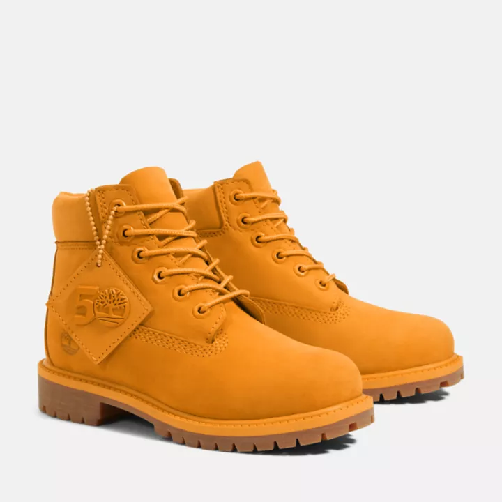 Bota Timberland Premium de 6 polegadas impermeável, edição 50, para jovens, na cor laranja.