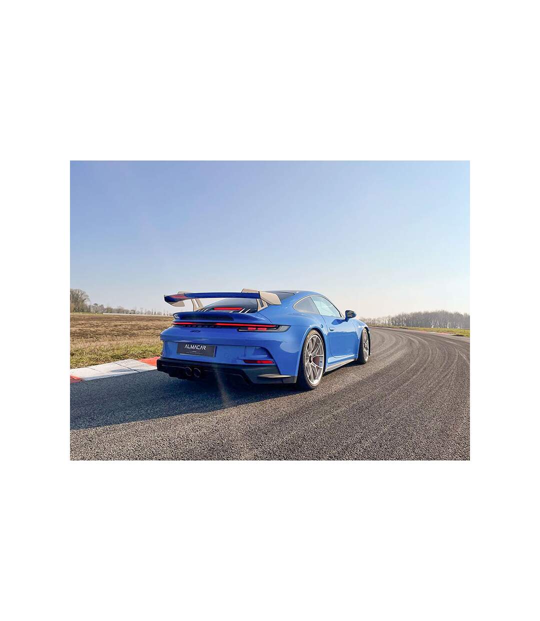 Stage de pilotage : 2 tours de cuircuit au volant d'une Porsche 992 GT3 - SMARTBOX - Coffret Cadeau Sport & Aventure