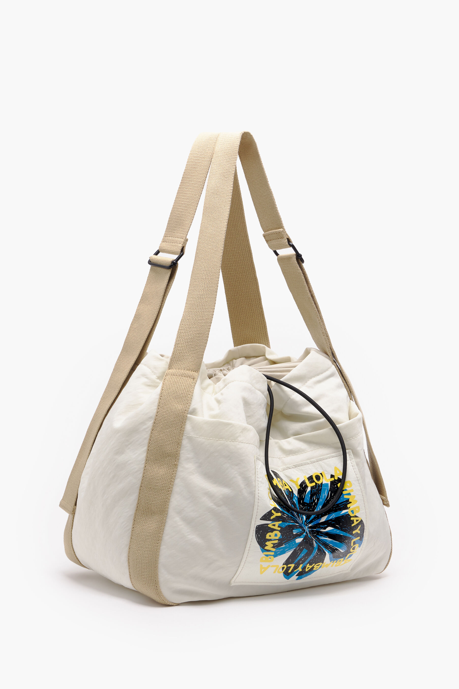 Saco grande de nylon com cordão e estampa de pedra.