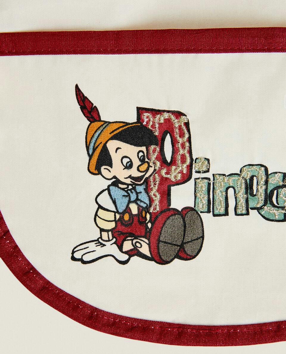 BABADOR INFANTIL DE NATAL DO PINÓQUIO DA DISNEY, REVESTIDO DE RESINA