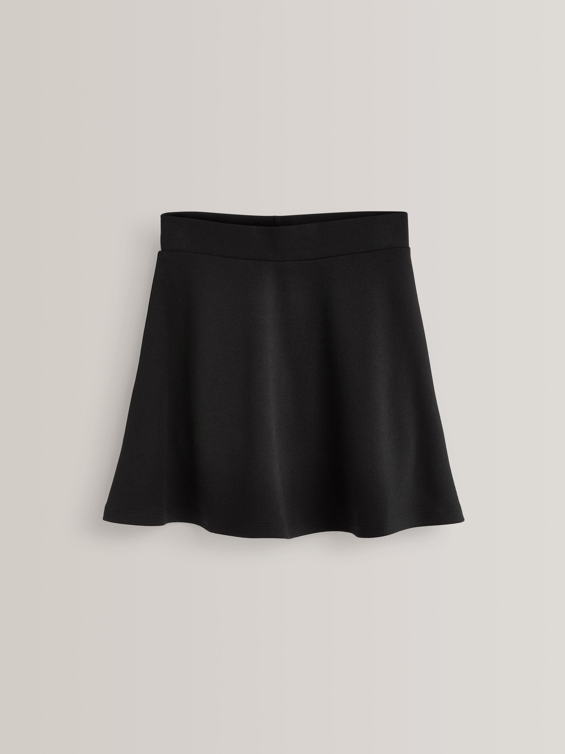 Zwart - Aantrekskirt voor school met jersey stretch (3-17jr)
