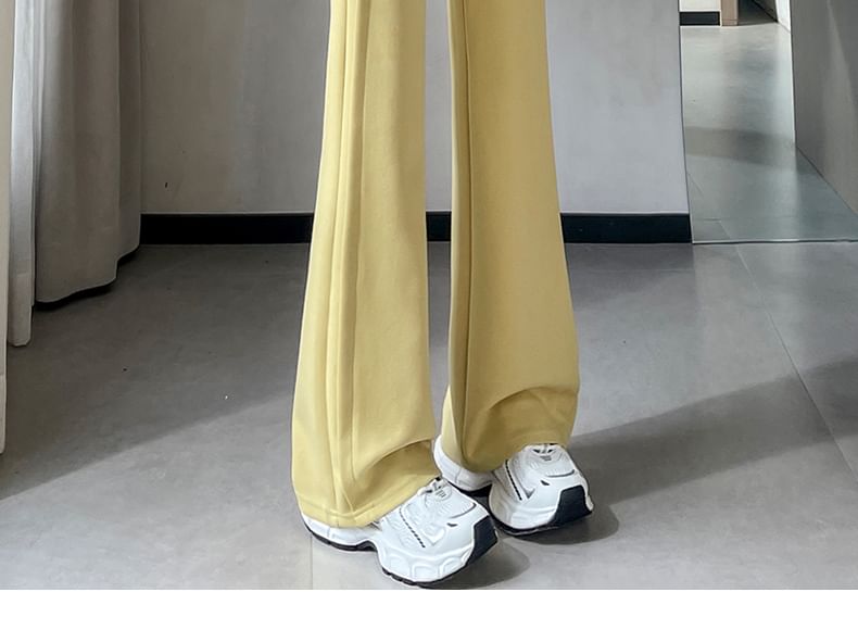 Tel tot 10 - Effen wijd uitlopende broek met trekkoord in de taille (verschillende ontwerpen)