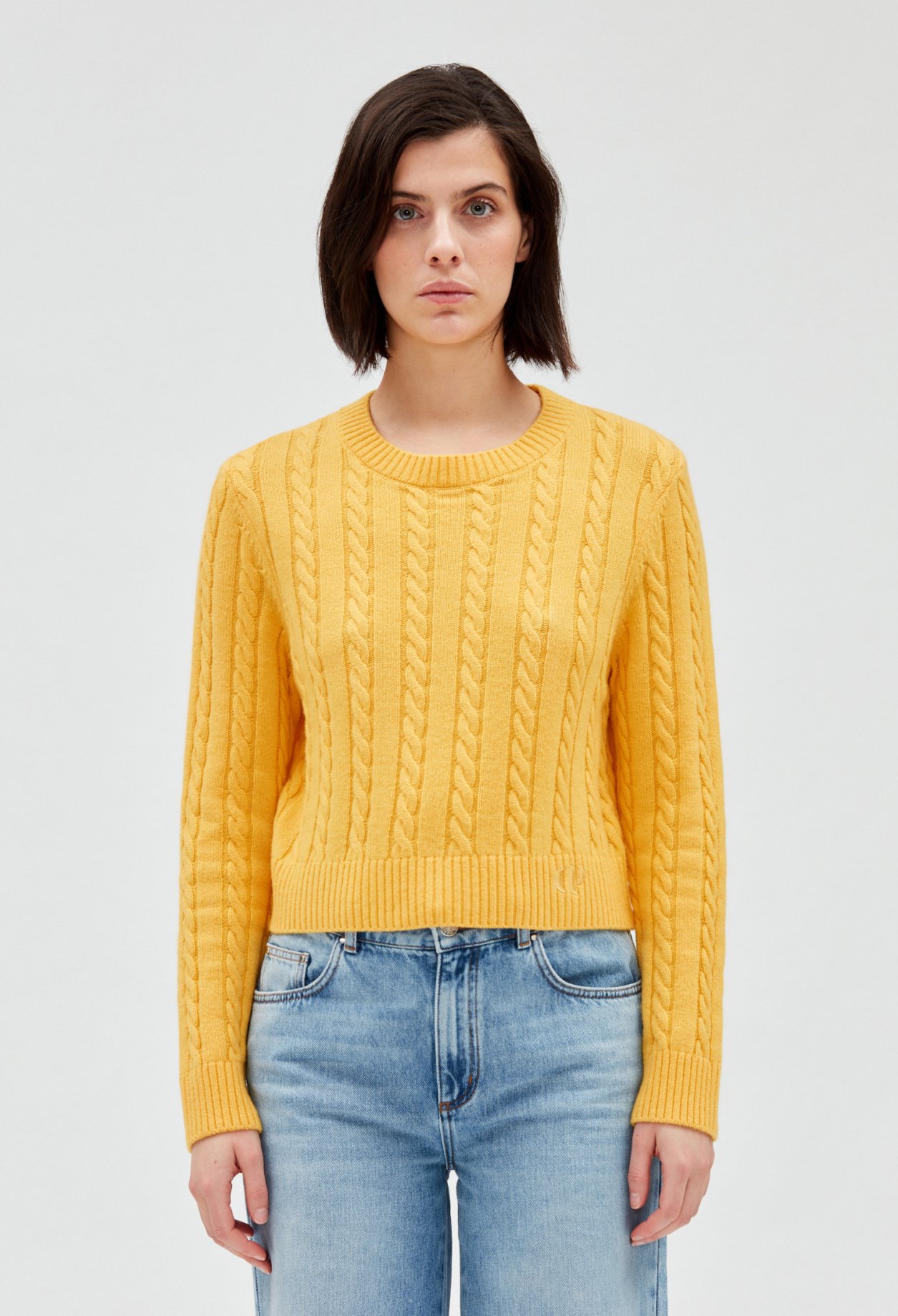 Pull court maille torsadee