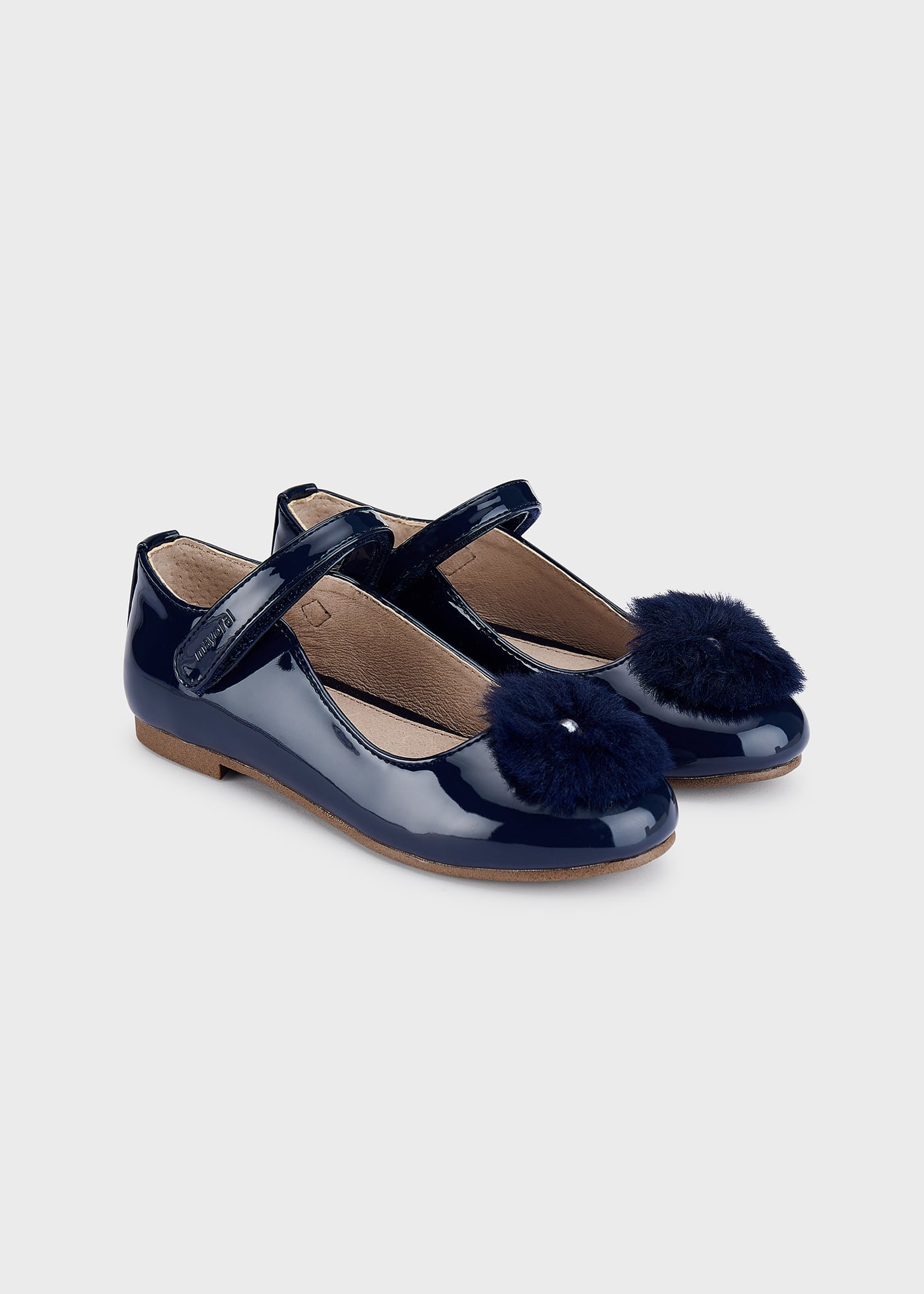 Sapato estilo Mary Jane com palmilha de pompom, em couro sustentável, para meninas.