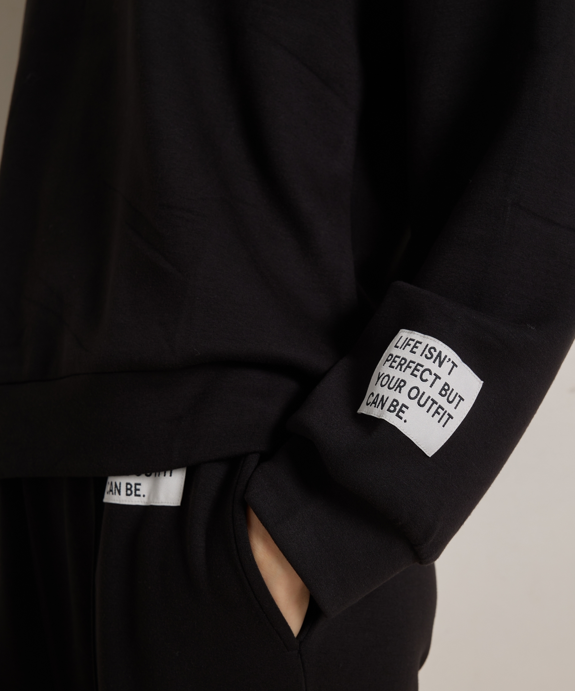 trui met mouwlabel