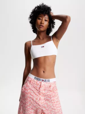 Top cropped ultra com amarração nas costas e distintivo