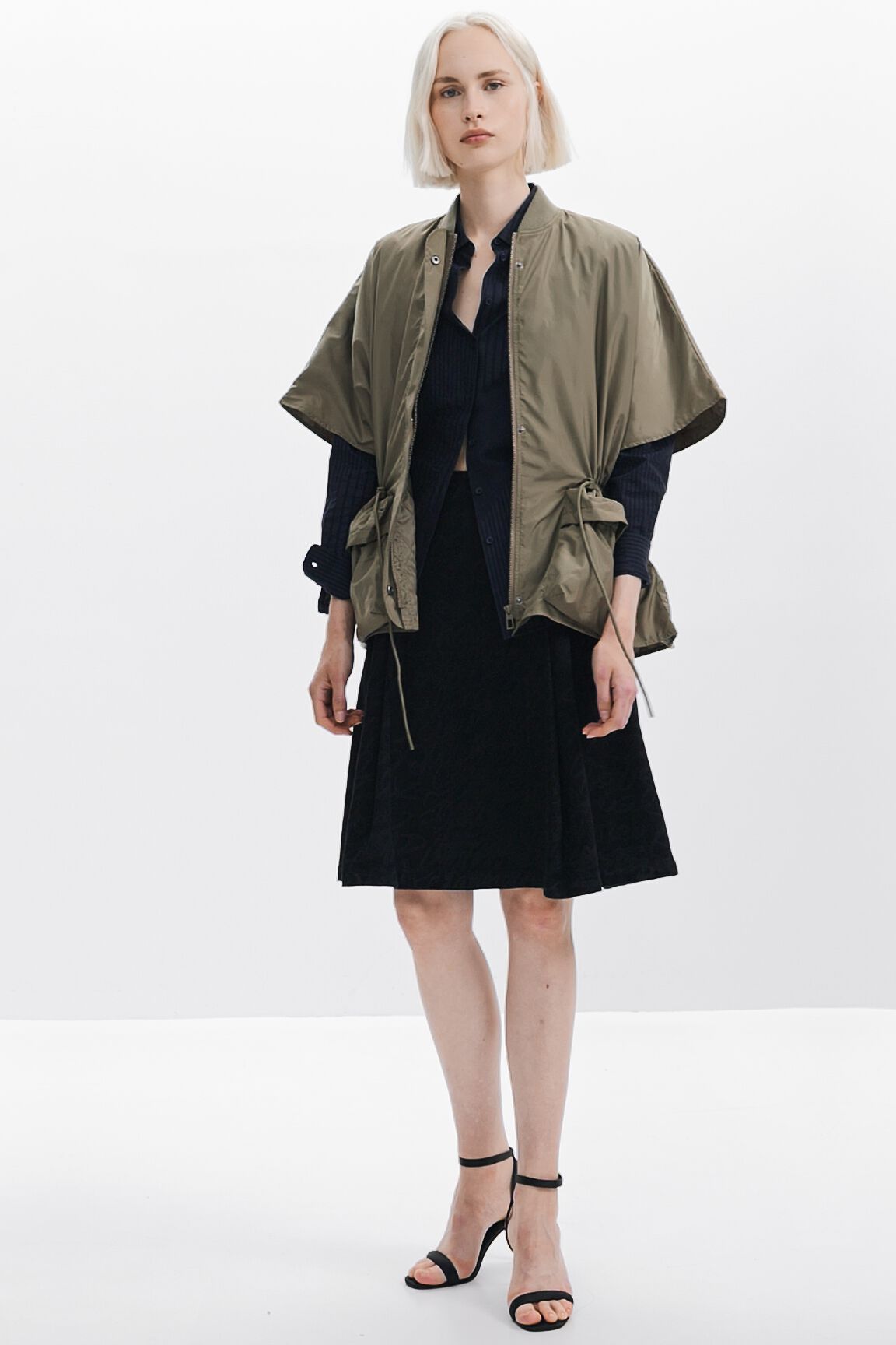 Poncho de nylon ajustável