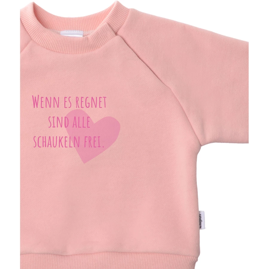 Liliput Sweatshirt 'Wenn es regnet sind alle Schaukeln frei' rosa