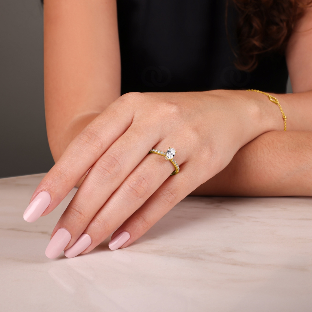 0.77ct Diamanten Pavé Solitärring 750/18 K Gelbgold