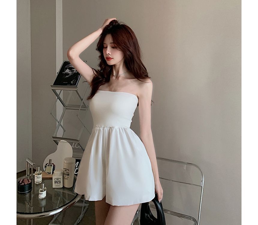 Cerauno - Strapless romper met wijde pijpen