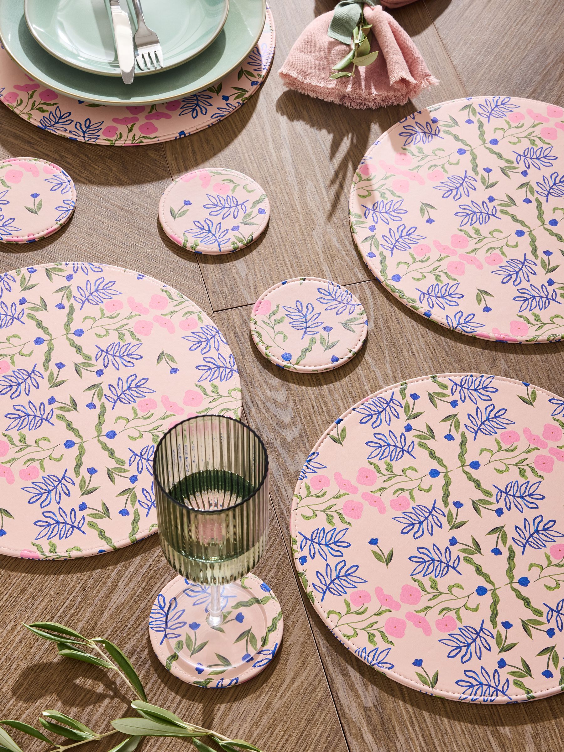 Set van 4 bedrukte imitatieleren placemats en onderzetters