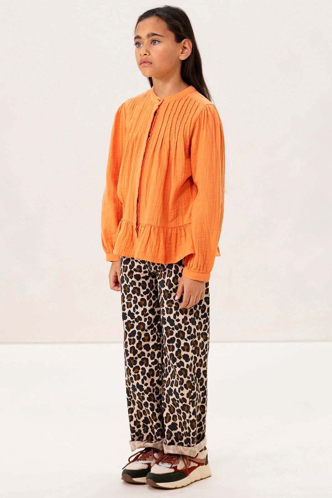 Oranje blouse met pintuck details