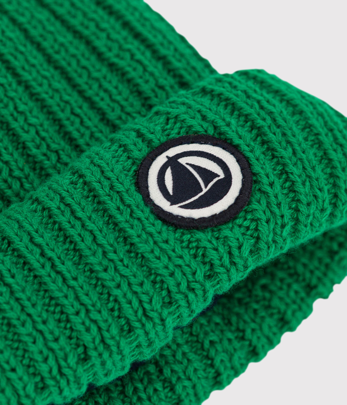 Bonnet bébé en tricot doublé en polaire recyclée