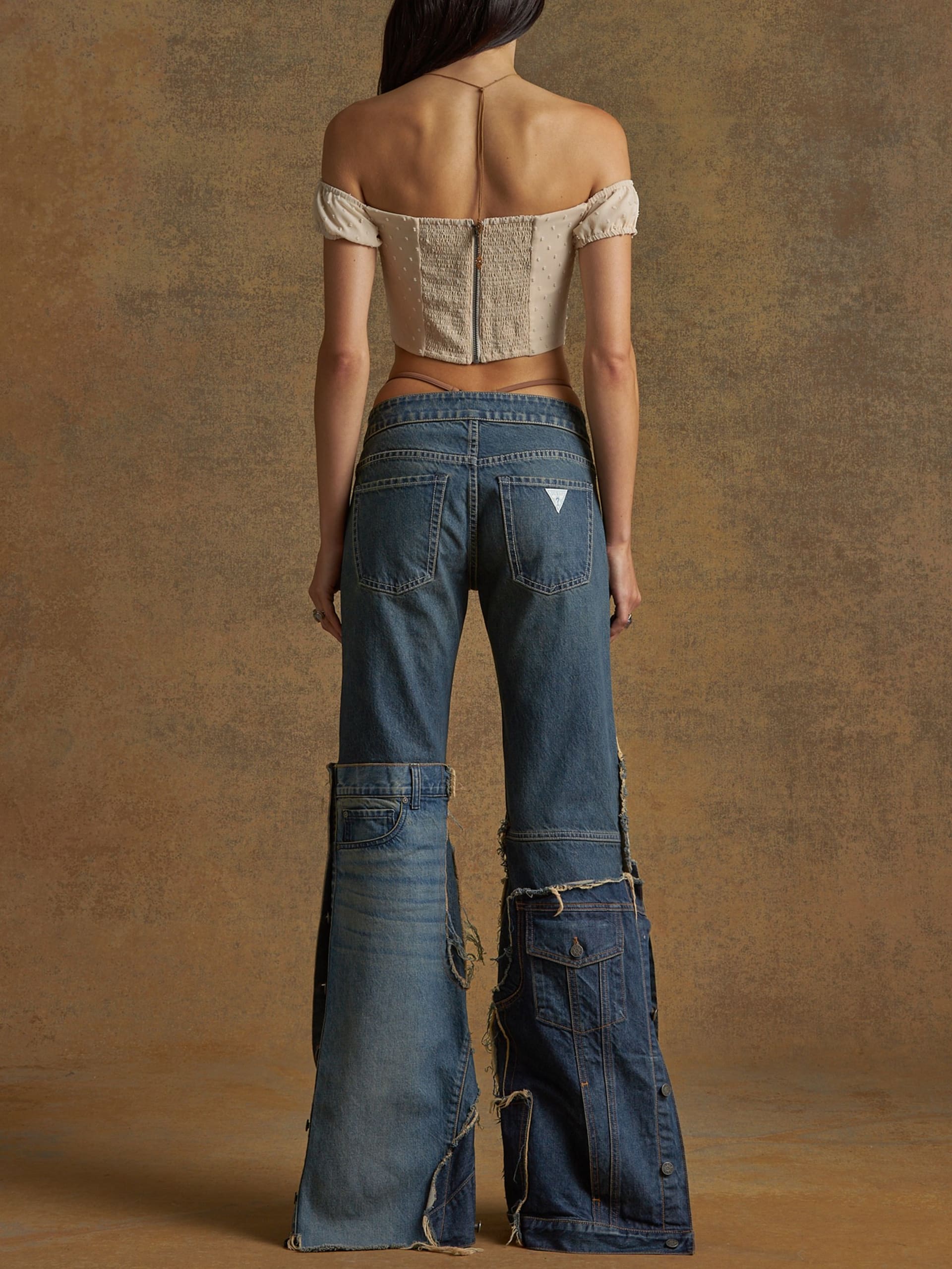 calças jeans de patchwork de pernas largas