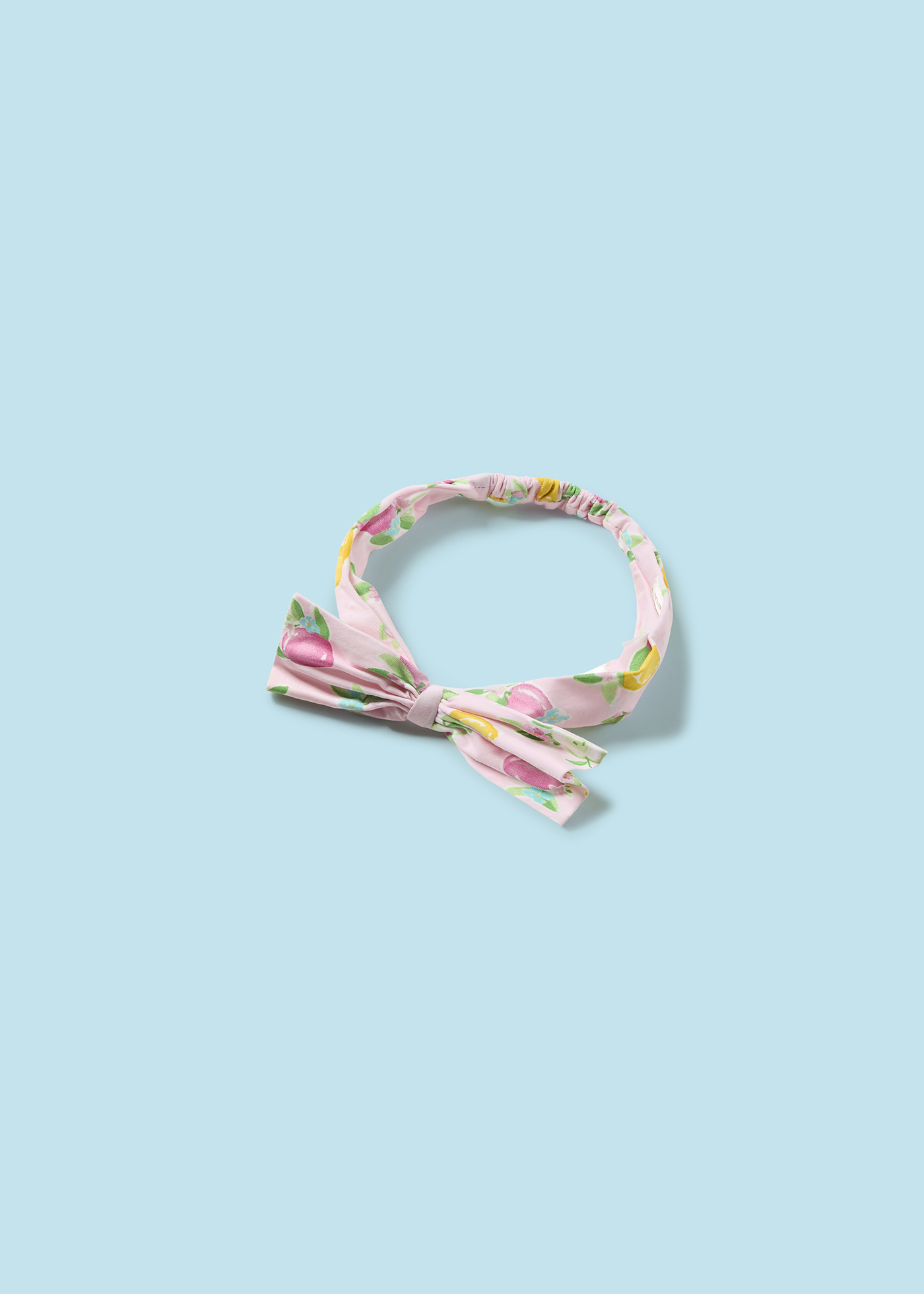 Macacão Better Cotton Juicy para recém-nascido com faixa de cabeça e estampa de frutas.