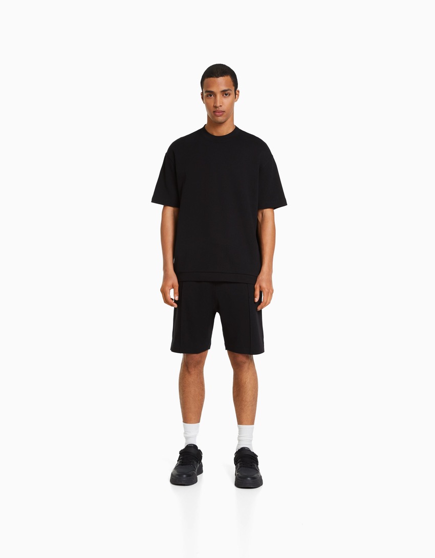 Bermuda de pelúcia Interlock