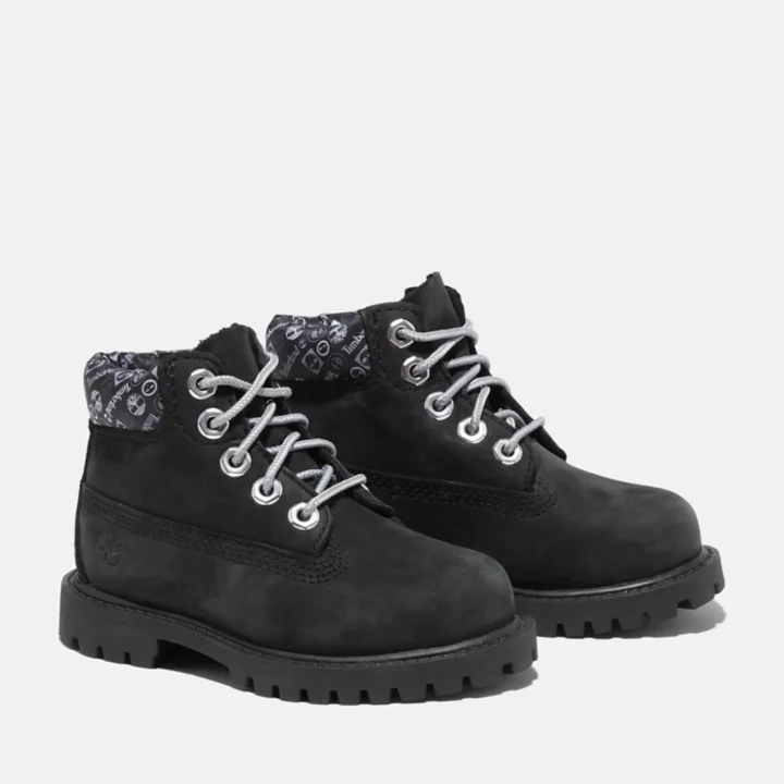 Bota infantil premium impermeável de 15 cm na cor preta.