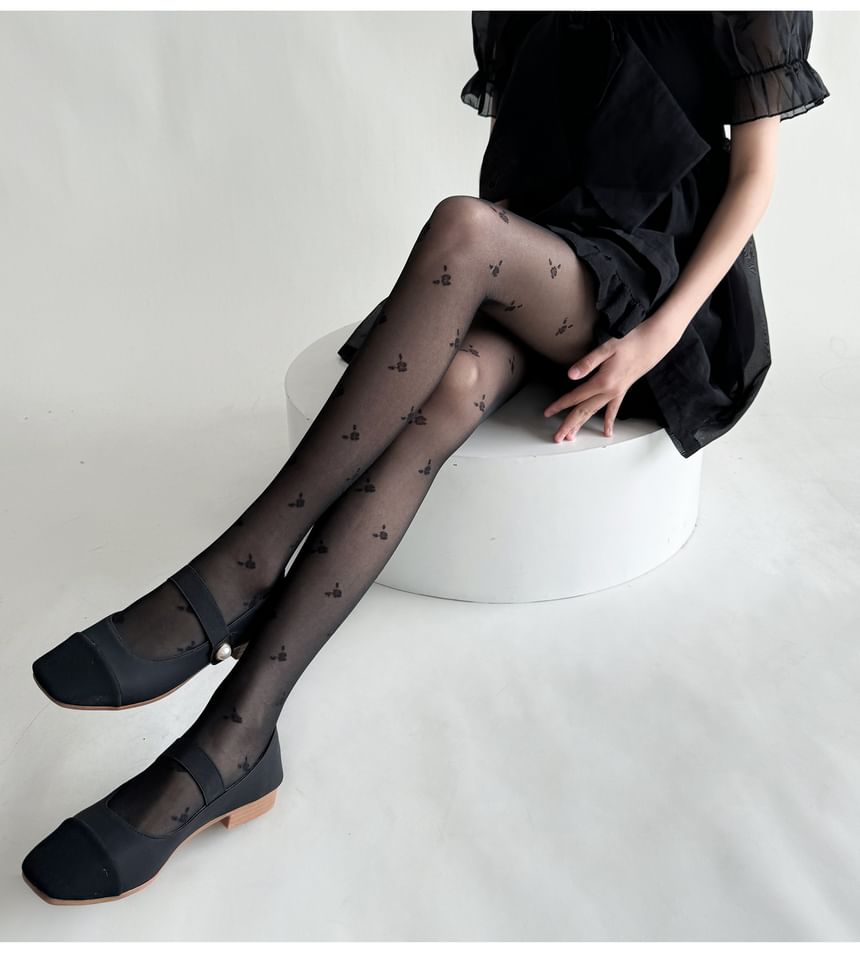 Allinya - Bloemen doorschijnende panty's