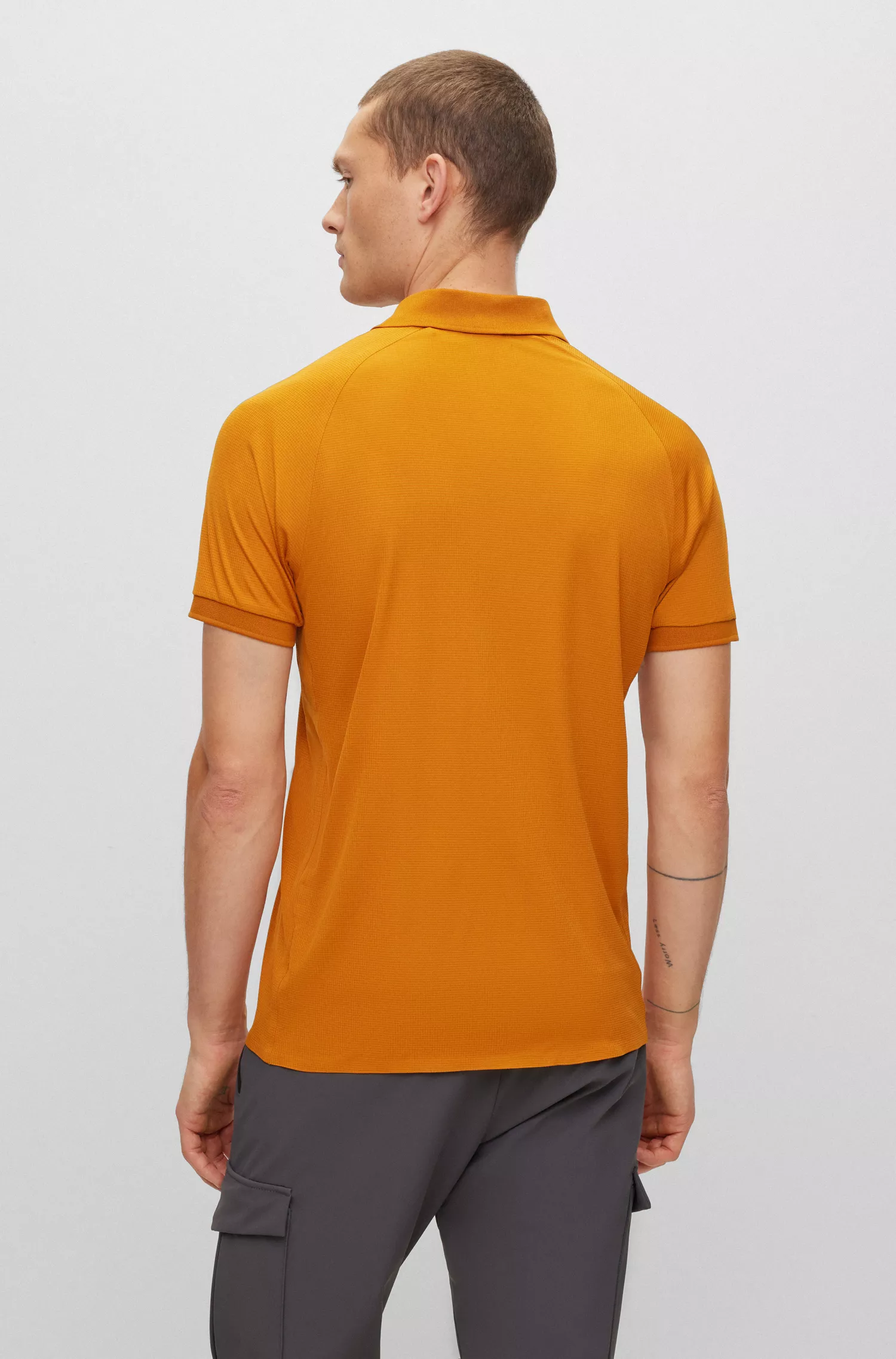 Camisa polo BOSS verde-limão em malha estruturada