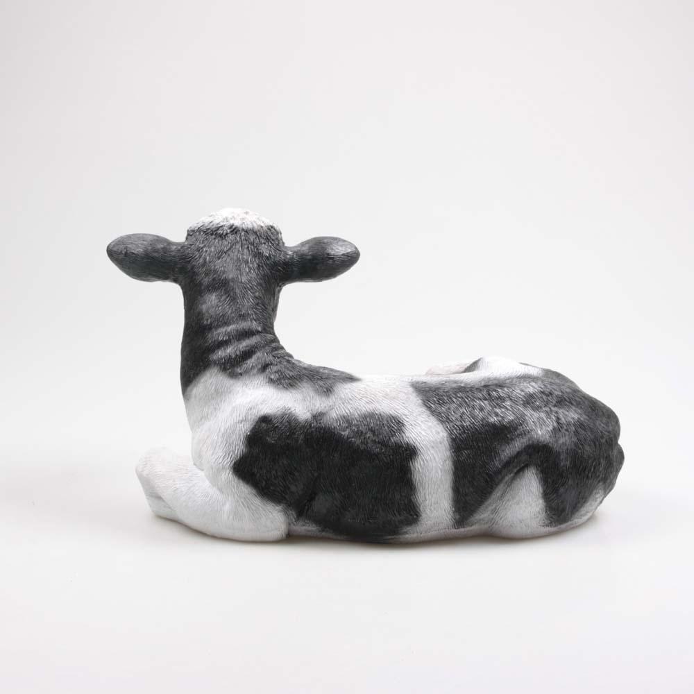 Vache couchée en résine 46 x 28 x 27 cm