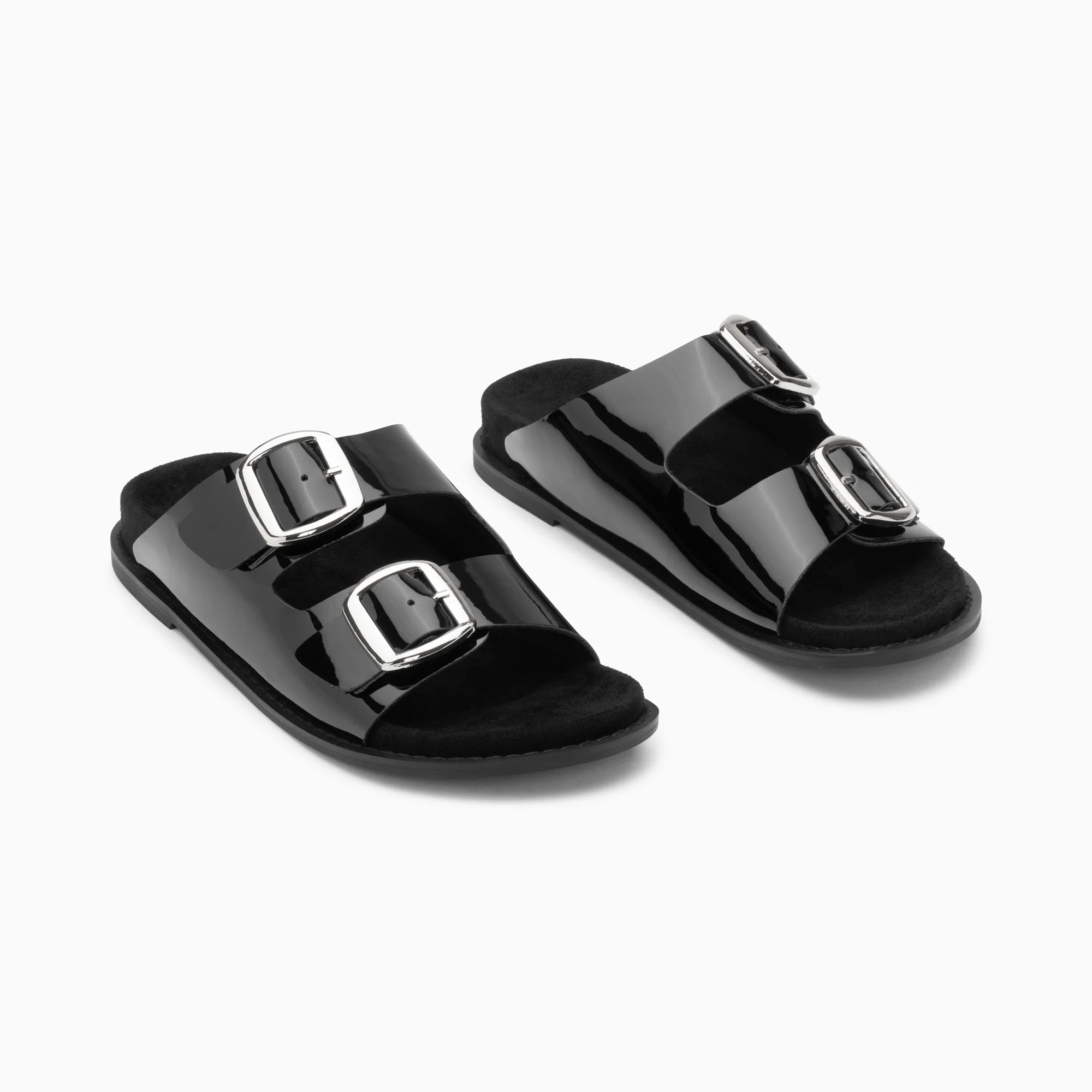 Sandales plates-Mules plates Célia noir verni à boucles oversize