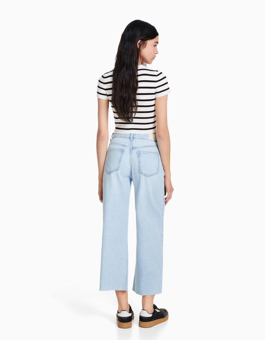 calças jeans cropped de perna larga