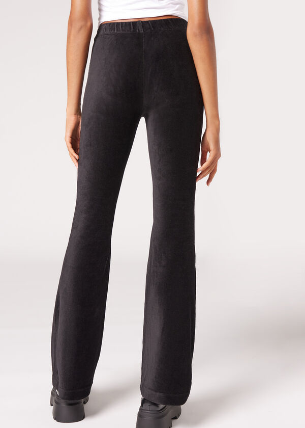 Calças legging flare de veludo cotelê