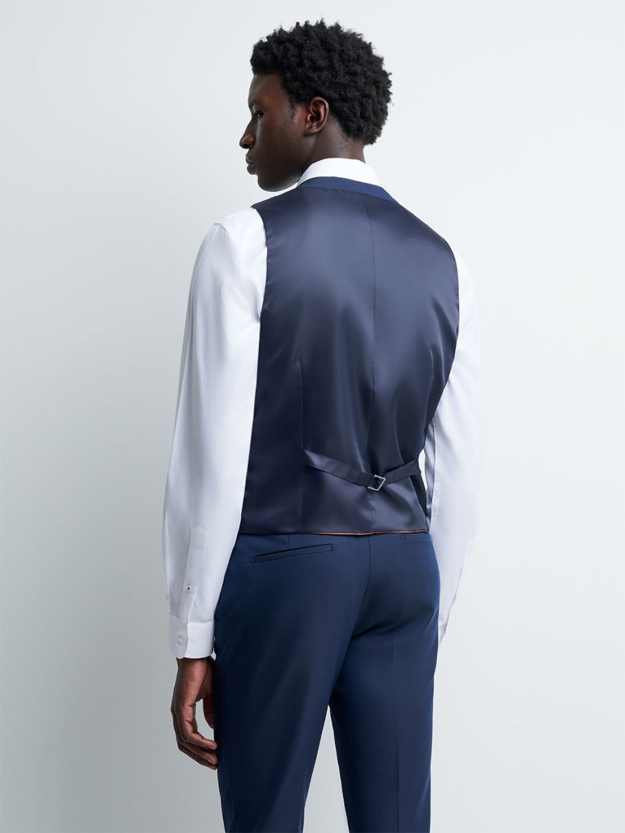 Gilet coordonnable en poly-viscose uni