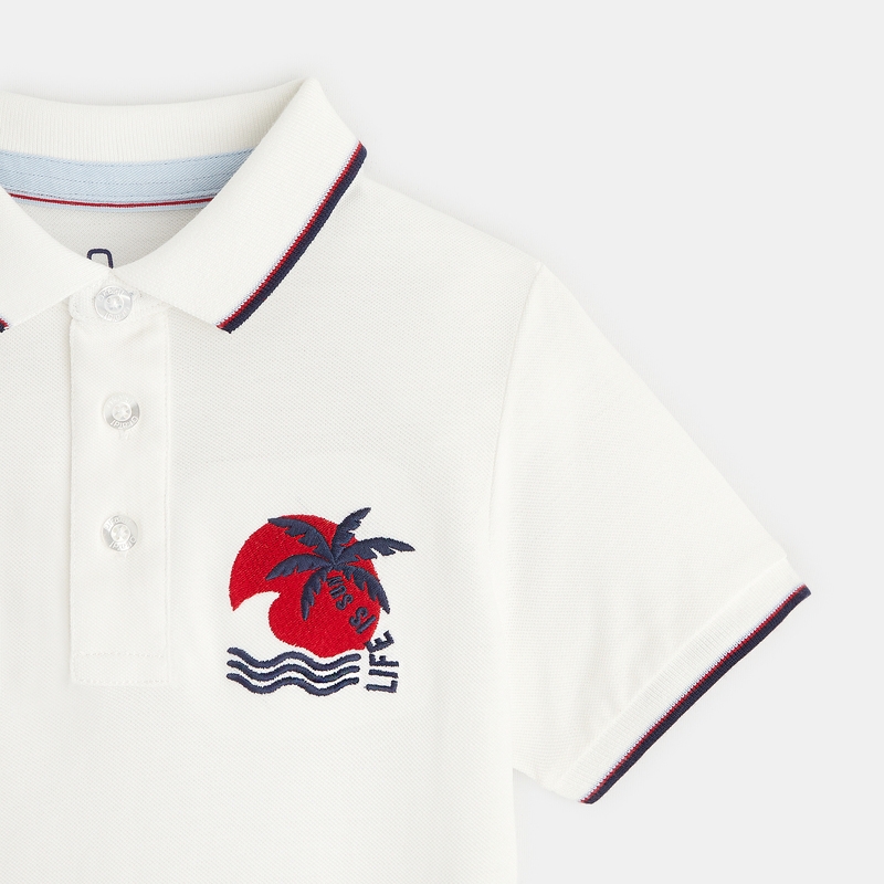 Polo en jersey piqué motif palmier blanc garçon