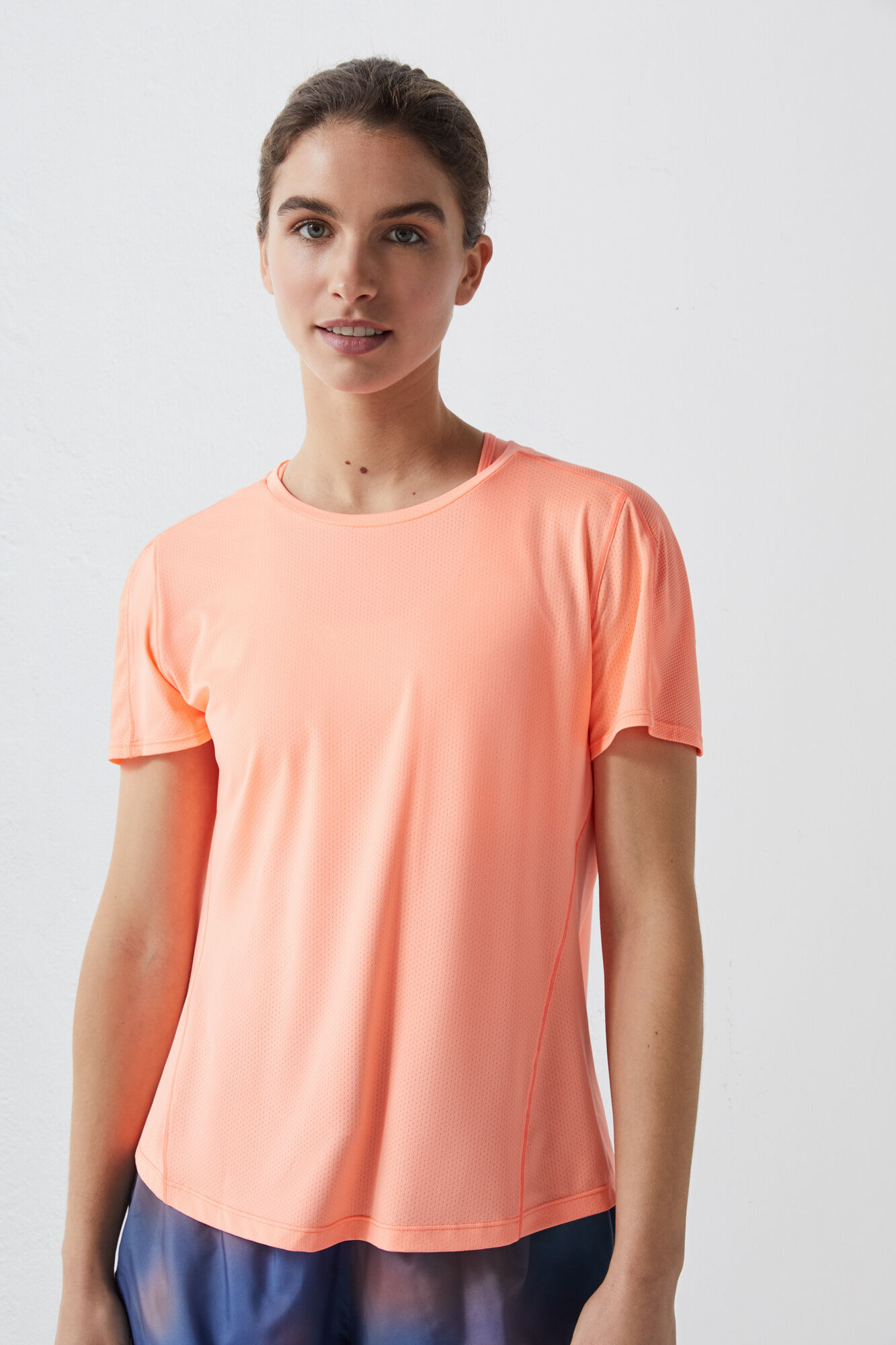 Camiseta técnica respirável laranja-avermelhada