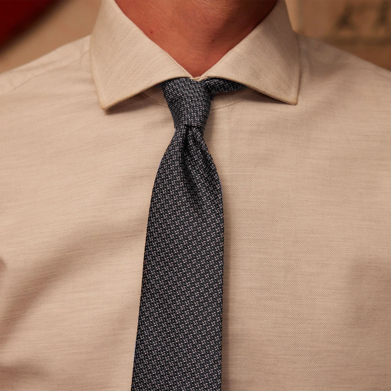 Blue and gray patterned tie