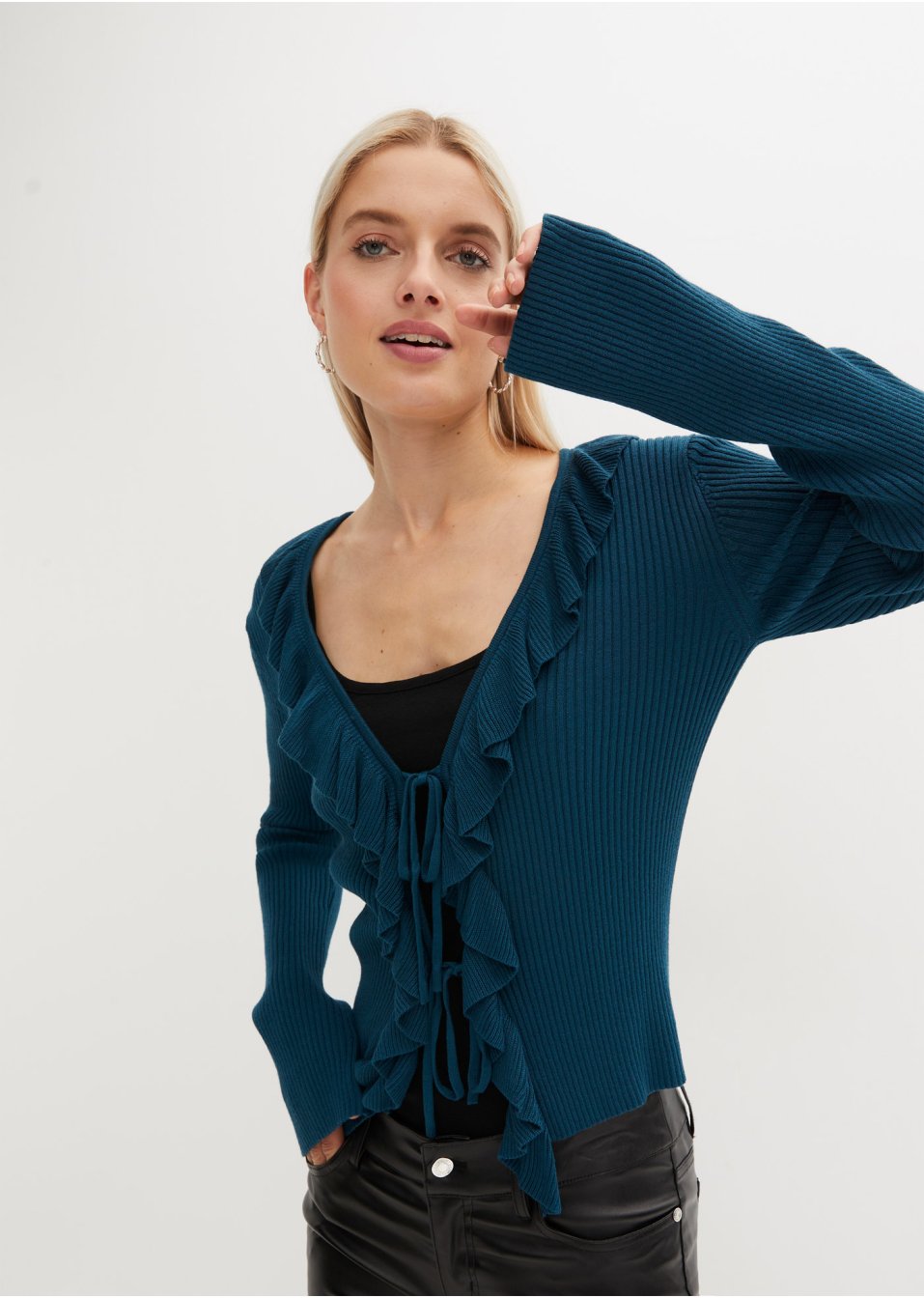 Gilet en maille avec volants