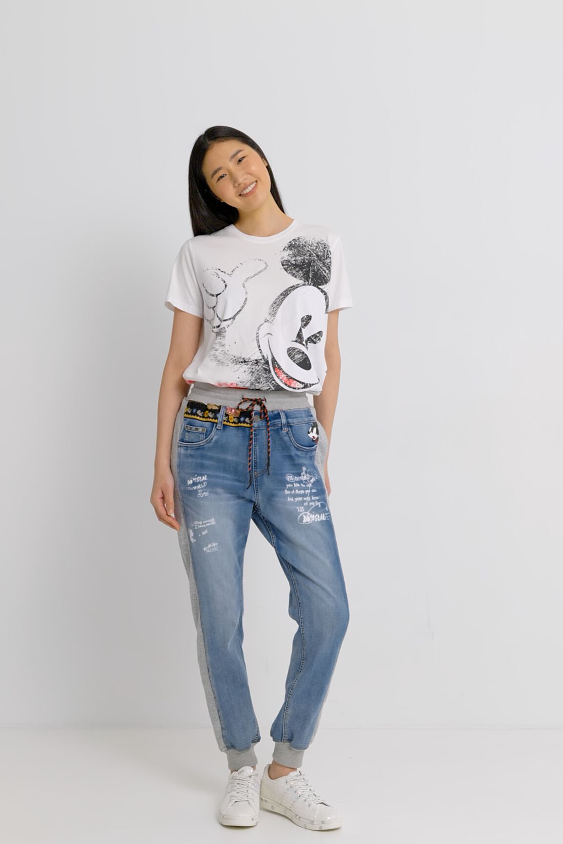 Jean jogging Mickey Mouse