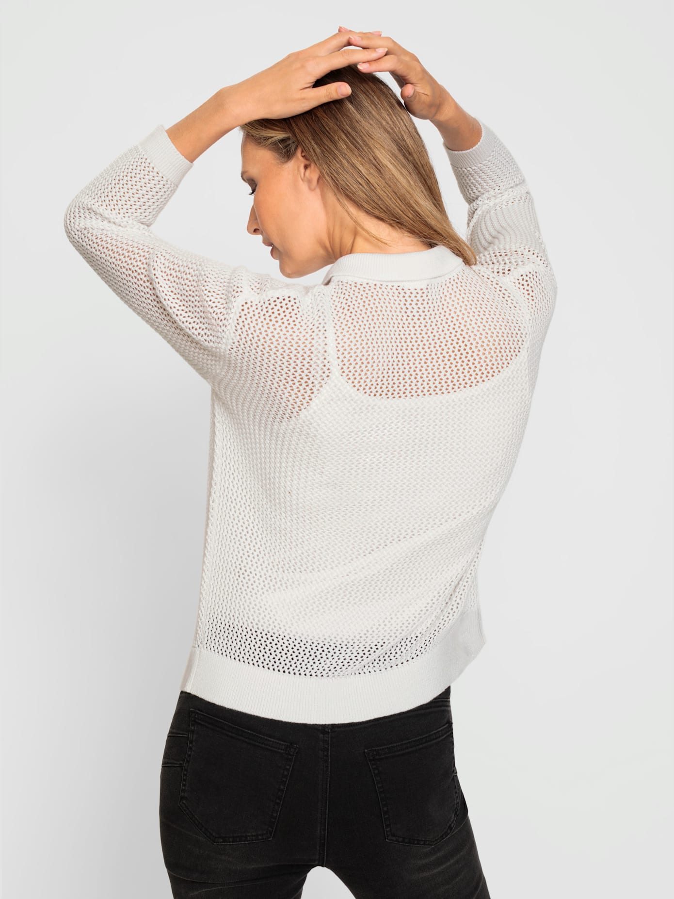 Veste en tricot motif ajouré transparent discret