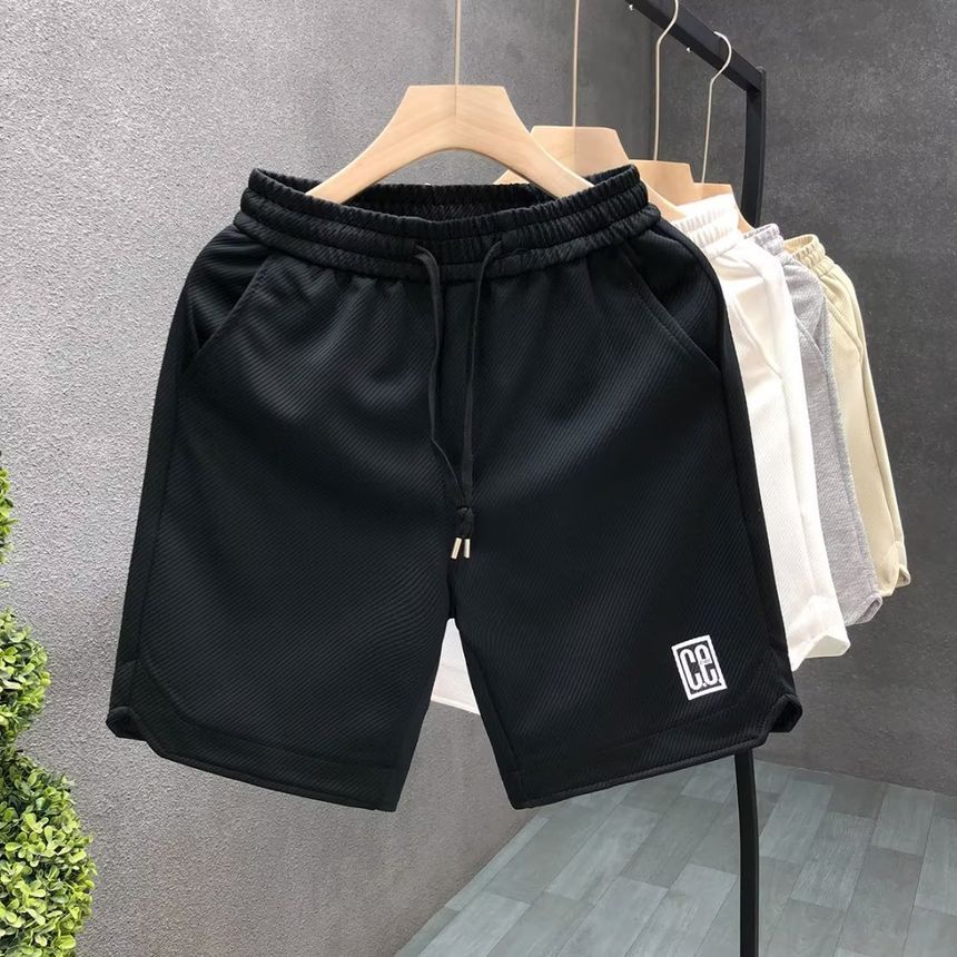 Mokoloko - Sweatshorts met trekkoord en letterprint